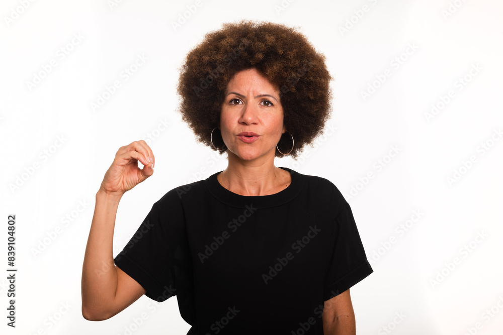 Female interpreter of the Brazilian sign language, Libras, making the letter O. Female interpreter of the Brazilian sign language, Libras, making the letter O.