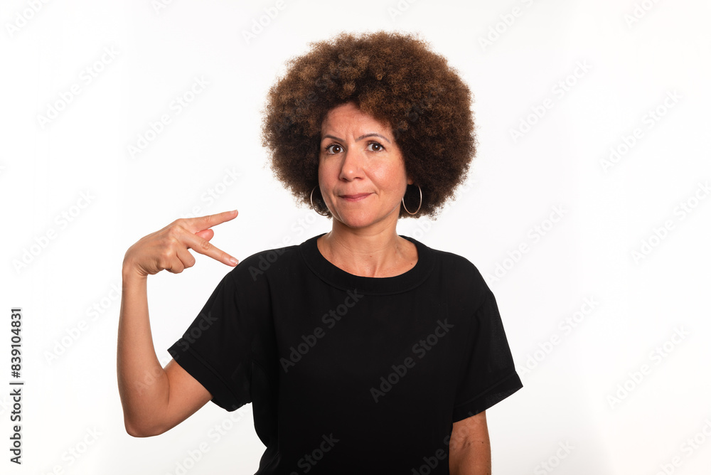 Female interpreter of the Brazilian sign language, Libras, making the letter P. Female interpreter of the Brazilian sign language, Libras, making the letter P.