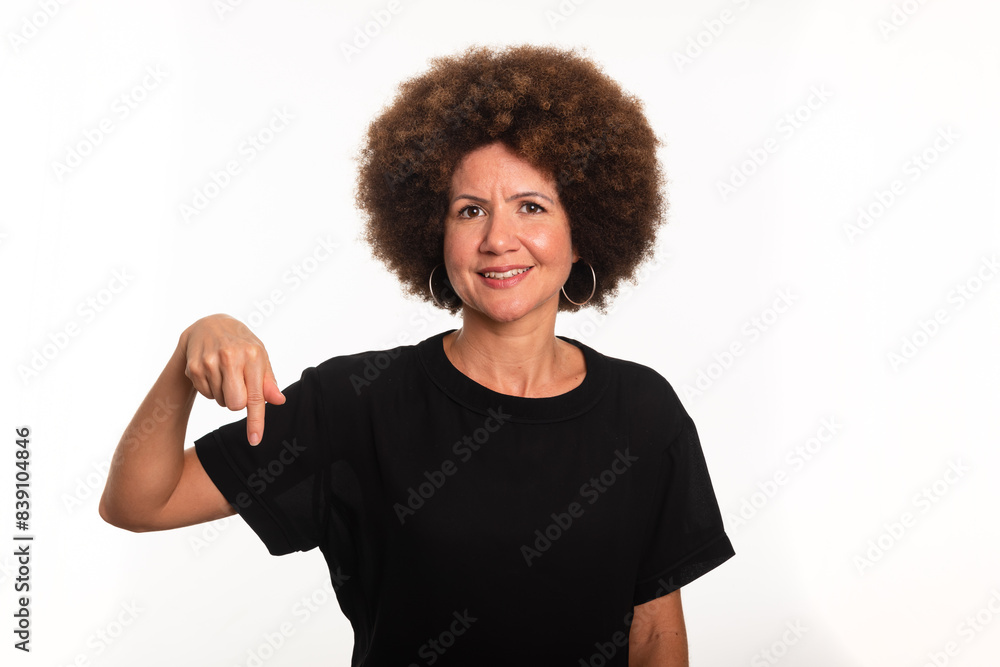 Female interpreter of the Brazilian sign language, Libras, making the letter Q Female interpreter of the Brazilian sign language, Libras, making the letter Q
