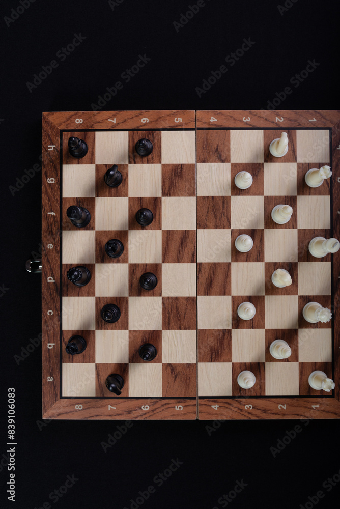 Chess board with pieces. Game concept. Board game. Hobby. Photographed from above.