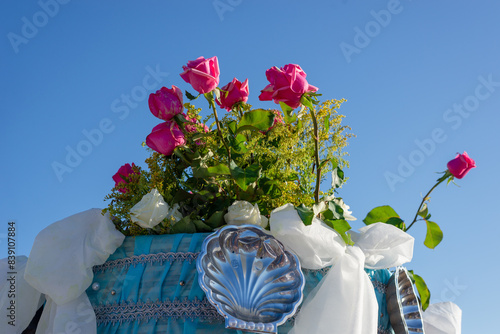 Candomble fans are seen taking flowers to give iemanja in the city of Salvador, Bahia. photo