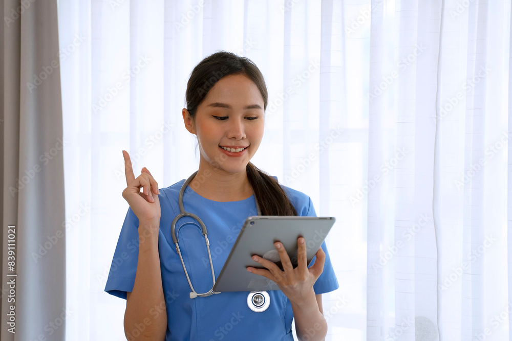 Female health care worker is using digital tablet. Female health care worker is using digital tablet.