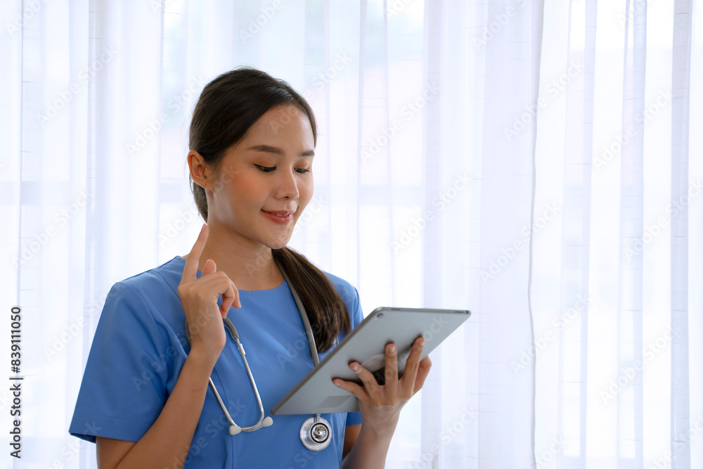 Female health care worker is using digital tablet. Female health care worker is using digital tablet.