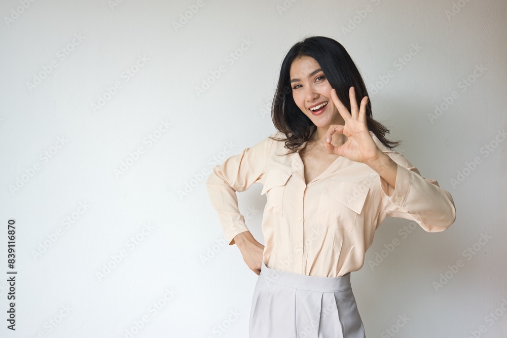 South Asian Woman giving approving, yes, alright, ok, positive, OK for all correct gesture South Asian Woman giving approving, yes, alright, ok, positive, OK for all correct gesture