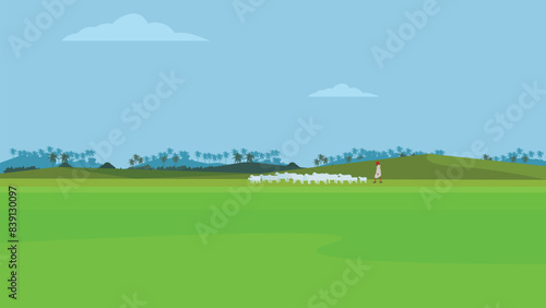 Man herding sheep in green Landscape Background