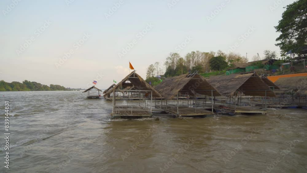 Lake or river water rafting, paddling on boat canal in park. Sightseeing in forest trees at Mae Sot ,Tak, Thailand. Nature landscape. Tourist adventure activity. Travel in vacation. Lake or river water rafting, paddling on boat canal in park. Sightseeing in forest trees at Mae Sot ,Tak, Thailand. Nature landscape. Tourist adventure activity. Travel in vacation.