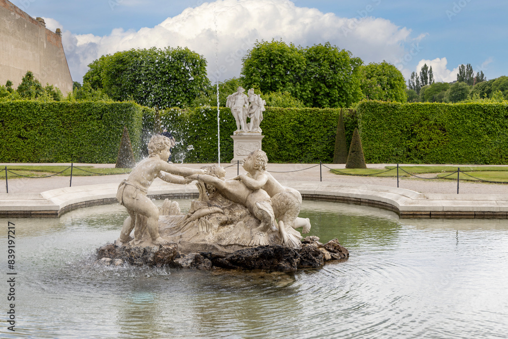 Vienna, Austria - April 25, 2024 : Belvedere Gardens with fountain in front of Lower Belvedere palace