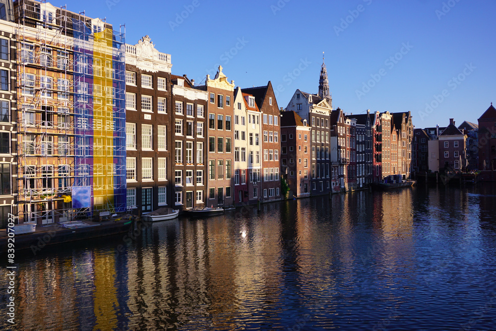 Fototapeta premium View of buildings in city against clear sky