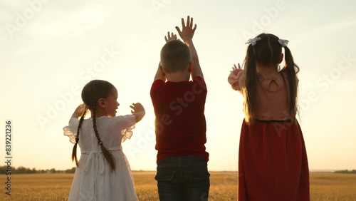 little child kid boy girl stretch their hand sun, ray fingers, vacation travel, sun playful children, kids sun fascination, familial religious activities, happy religious family, fostering happiness photo
