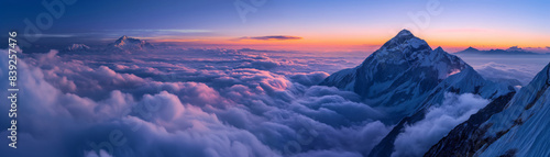 Mount Everest at Twilight above the sea of clouds
