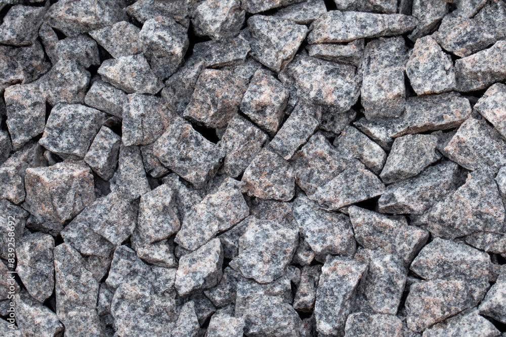 granite stones. large number of small gray granite stones top view close up concept of stones granite stones. large number of small gray granite stones top view close up concept of stones