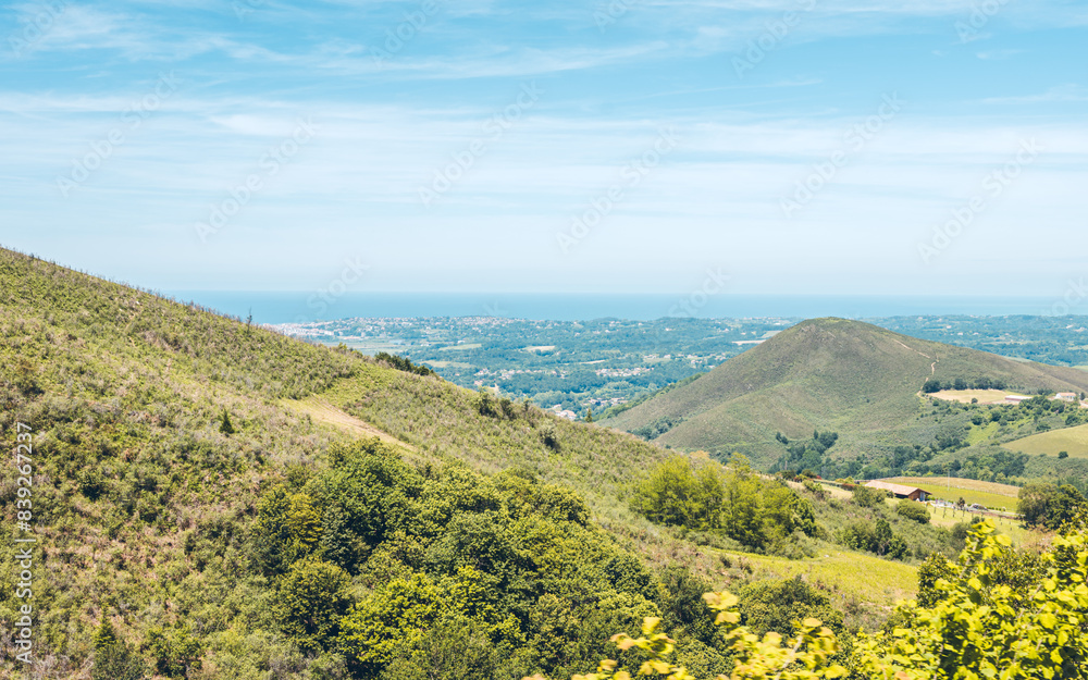Obraz premium Train de la Rhune is an authentic almost century-old collectible cogwheel train taking you to the most legendary summit of the Basque Country, a magnificent panorama of the Coast & the Basque Country