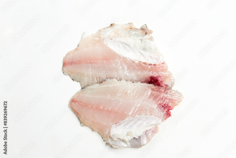 raw fish fillet meat isolated on white background raw fish fillet meat isolated on white background