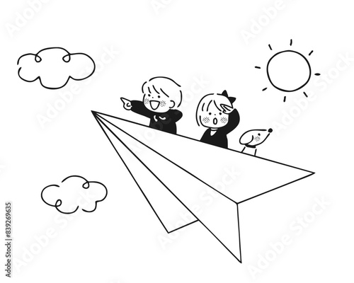 紙飛行機に乗っている子供　モノクロ