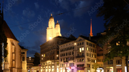 A night view of buildings and a tower
