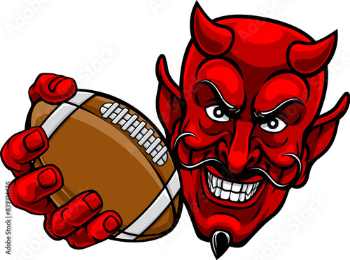 A devil or satan American football sports mascot cartoon character holding a ball