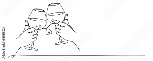 hand holding a wine glass