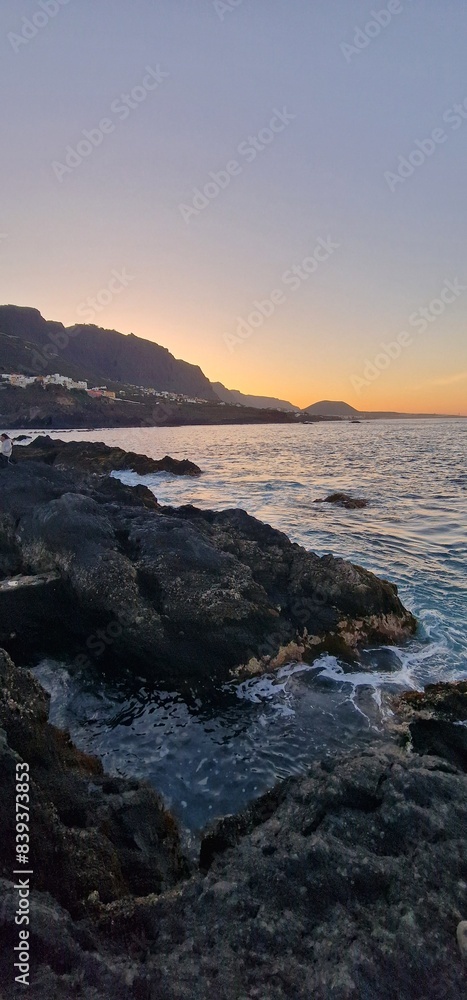 rocky shore and beautiful sunset in tenerife rocky shore and beautiful sunset in tenerife