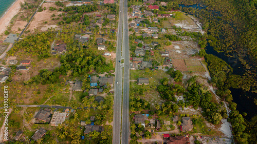 Aerial drone view of countryside settlement scenery at Pantai Jambu Bongkok, Marang, Terengganu, Malaysia photo