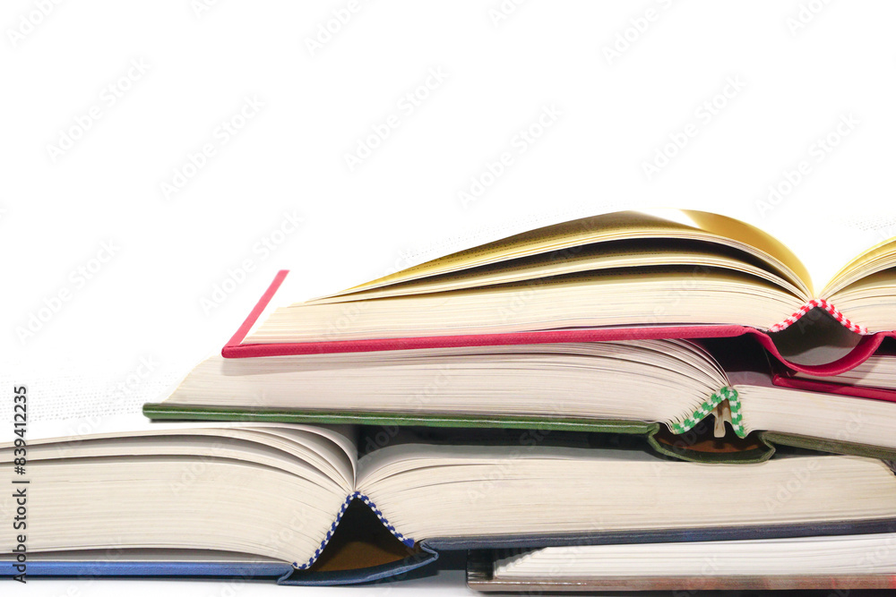 Stack of open books and stacked together. Knowledge and education concept. Stack of open books and stacked together. Knowledge and education concept.