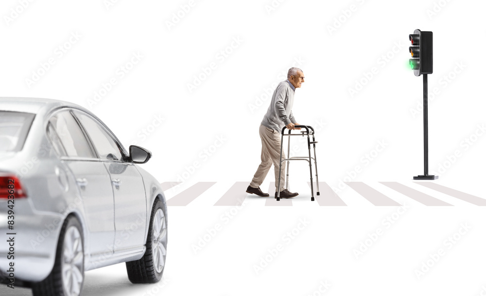 Full length profile shot of an elderly man with a walker at a pedestrian crossing Full length profile shot of an elderly man with a walker at a pedestrian crossing