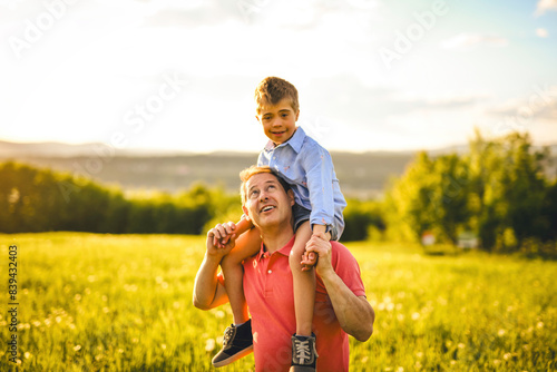 Nice father and child Playing on great field at Sunset © Louis-Photo