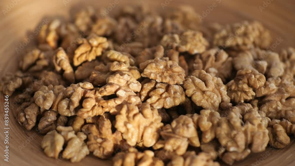Professional photographs of walnuts up close, emphasizing their texture and intricate natural features Professional photographs of walnuts up close, emphasizing their texture and intricate natural features