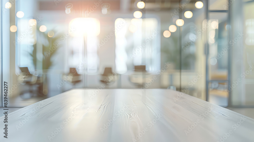 Empty white desk in bright office space. White wooden table with blurred background of modern office interior, perfect for product placement and mockups. Empty white desk in bright office space. White wooden table with blurred background of modern office interior, perfect for product placement and mockups.