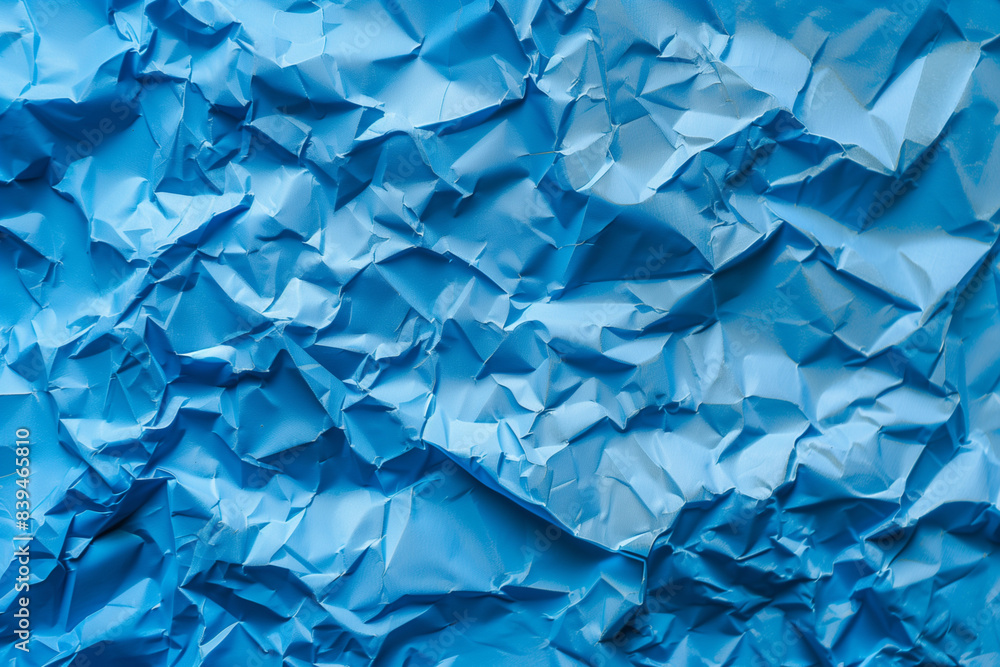 A blue paper with a crumpled texture A blue paper with a crumpled texture