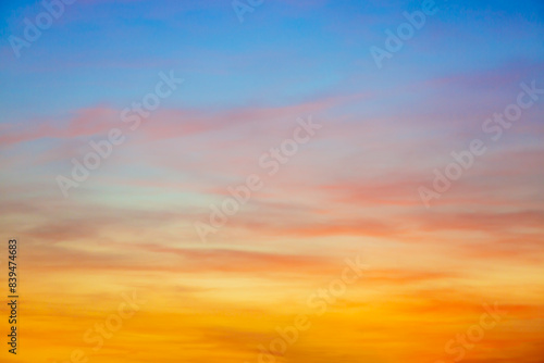 Clouds and sky in the evening Real majestic sunrise sundown sky background with gentle colorful clouds without birds. Panoramic  big size