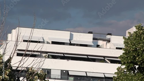 modern building under dark clouds