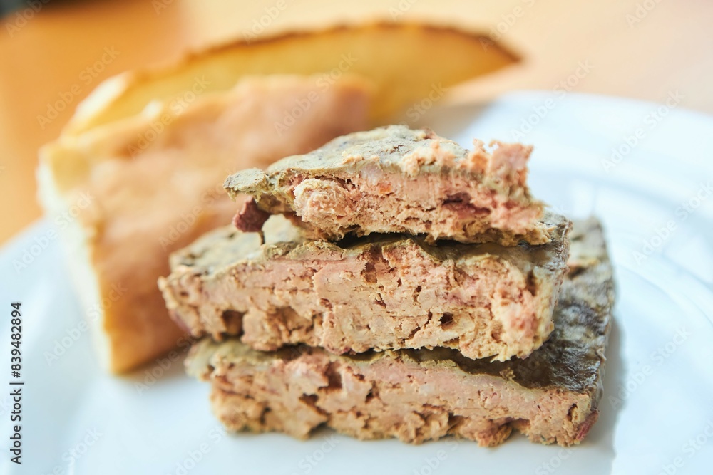 Meat pate on a white plate. Meat production Meat pate on a white plate. Meat production
