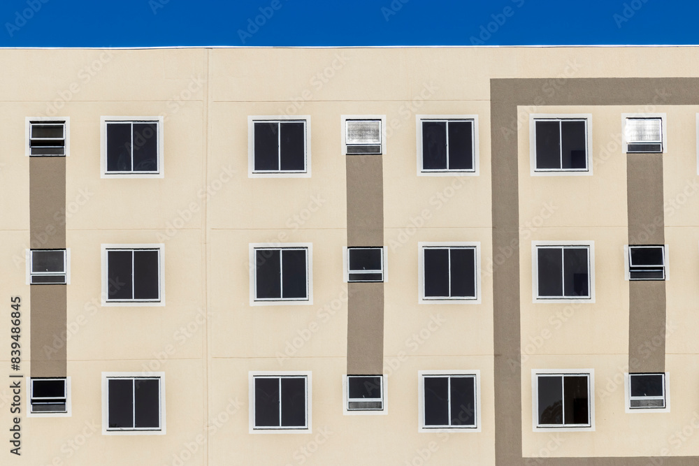 Facade with windows of a lower middle class residential building in Brazil Facade with windows of a lower middle class residential building in Brazil