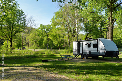 Travel trailer camping in the woods at Mississippi Palisades State Park, Illinois