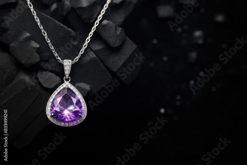 Necklaces with purple gem. amethyst Necklaces. Necklaces with large purple gemstone. purple diamond. purple Gemstone. Chain with purple gem pendant isolated. A beautiful purple diamond or amethyst n