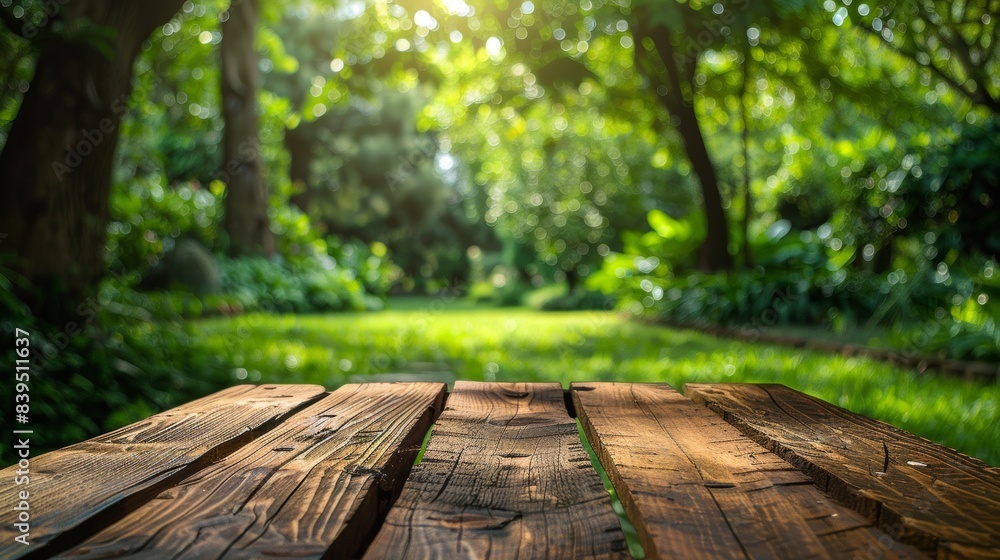 An empty wooden tabletop set against a lush An empty wooden tabletop set against a lush
