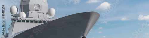 Fotografie Army warship on blue sky background
