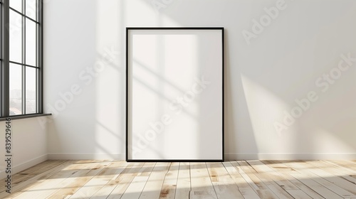 poster mockup on the wall in a large frame with natural light casting shadows  minimalist interior design with a plant