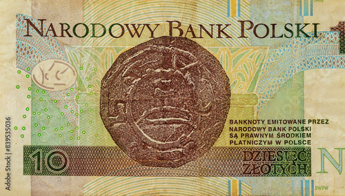 Money in form of Poland ten zloty issued by Narodowy Bank Polski at national currency rear view photo