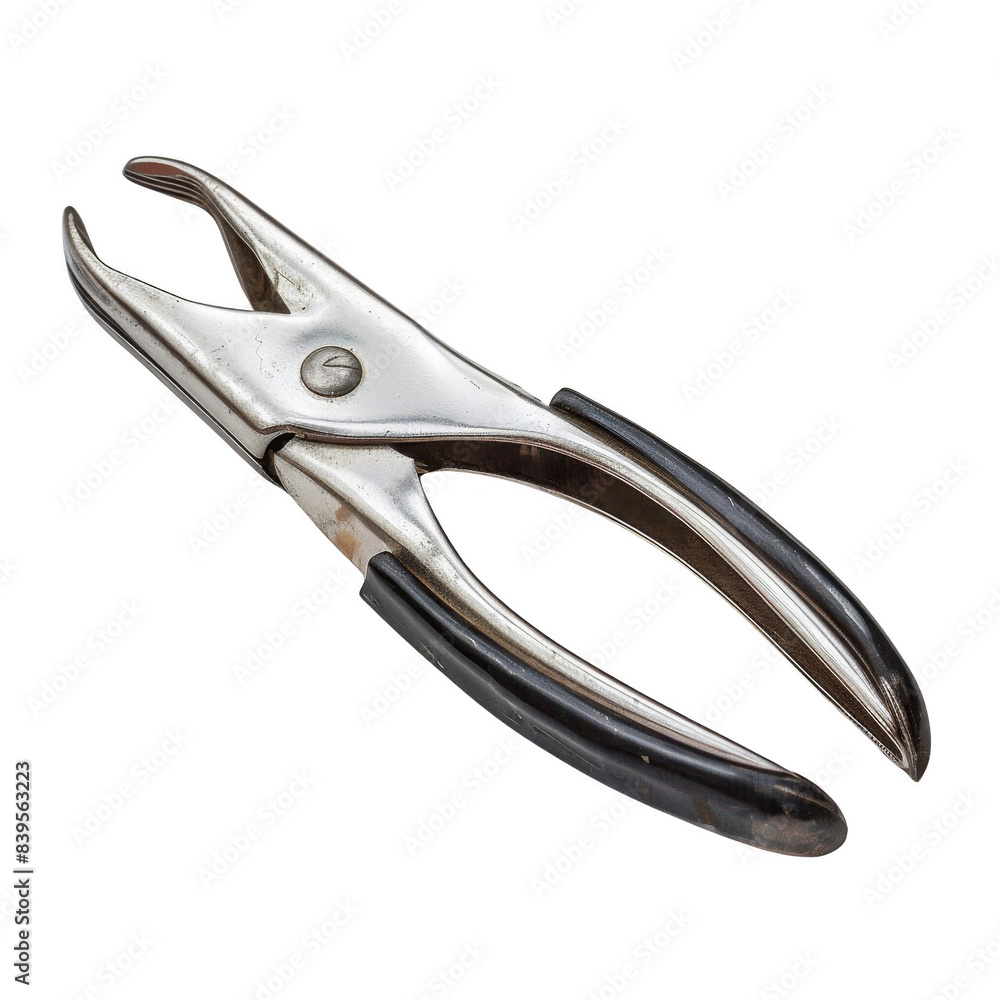Obraz premium Close-up of a metal spring clamp with black handles, commonly used in woodworking, crafts, and various DIY projects for holding materials together. PNG transparent