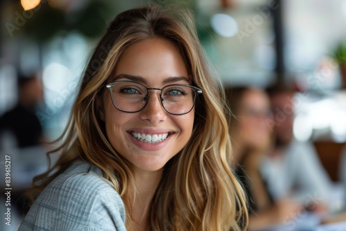 Happy female wearing spectacles smiling in eatery