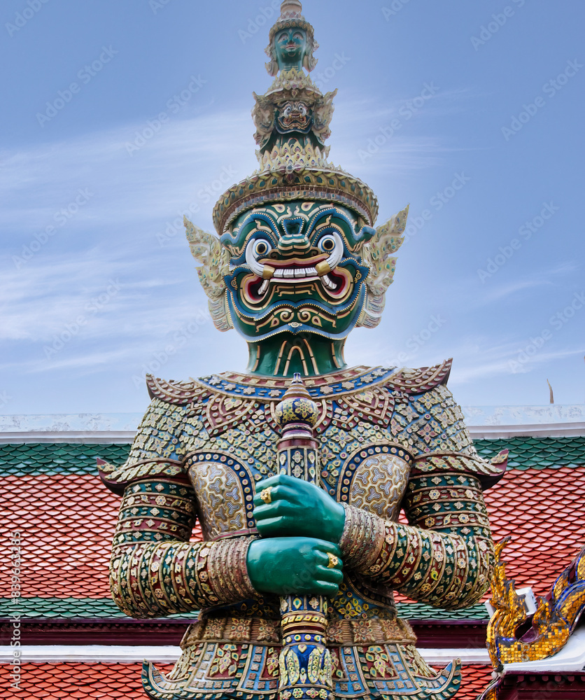 Statues of the demon guard at the entrance of the Wat Phra Kaew temple (Thailand, Bangkok), they are called Yaksha mythological creatures who protect the sacred places Statues of the demon guard at the entrance of the Wat Phra Kaew temple (Thailand, Bangkok), they are called Yaksha mythological creatures who protect the sacred places