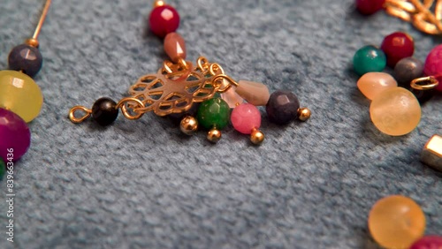 travelling video of bijou ear rings and beads