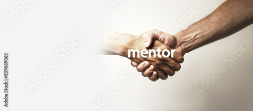 Handshake with Mentor Text Overlay on White Background. Ideal for Mentorship and Business Agreement Themes. Banner