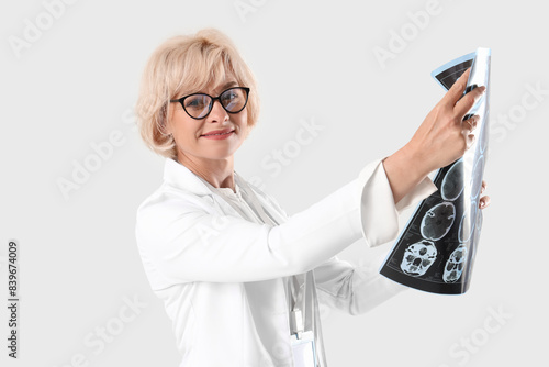 Female doctor with MRI scan...
