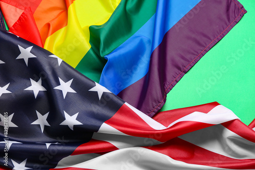 LGBT and USA flags on green background