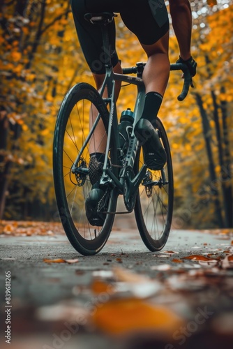 A person rides a bicycle on a road