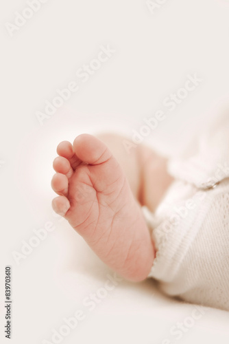 details of newborn baby with white background

