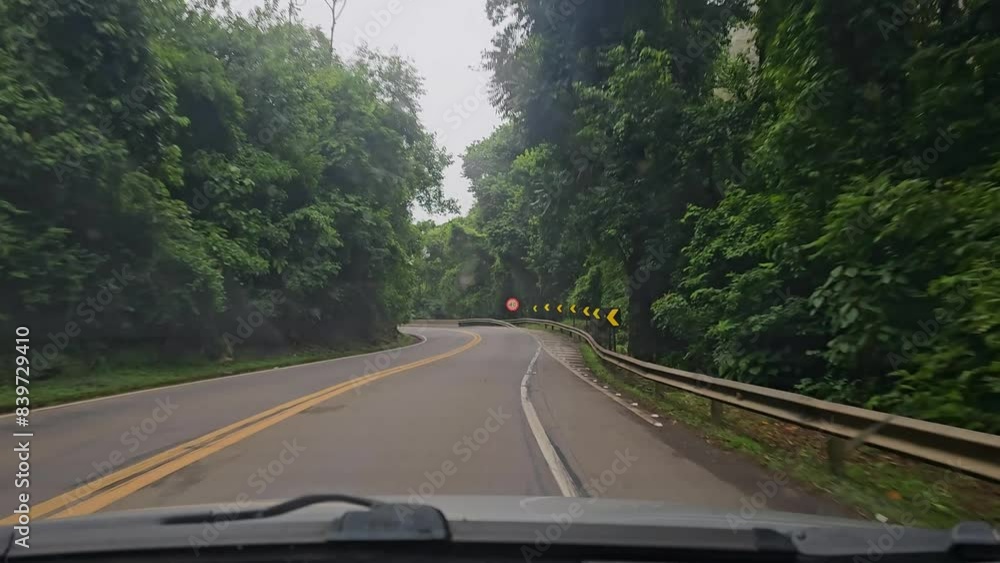 Car driving along Brazilian roads at sunrise. Natural light. selective focus. Car driving along Brazilian roads at sunrise. Natural light. selective focus.