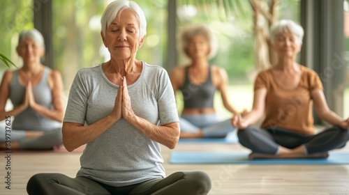 A group of elderly individuals in a yoga class all powered by the brain health supplements they take daily